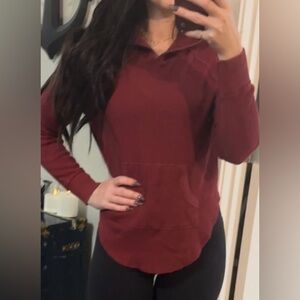 Aritzia Burgundy TNA waffle kangaroo pocket top